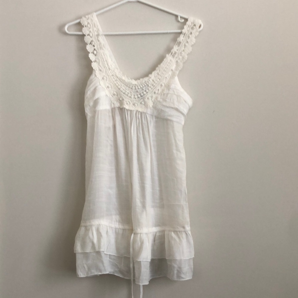 Simply irresistible cream peplum top size medium
